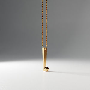 Gold plated silver jewel inspired by Yoga. The headsstand yoga pose, sirsasana, is stylized in a gold plated pendant.